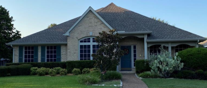 Light brick ranch home with multi-gable roof in Beacon Hill, Allen, Texas