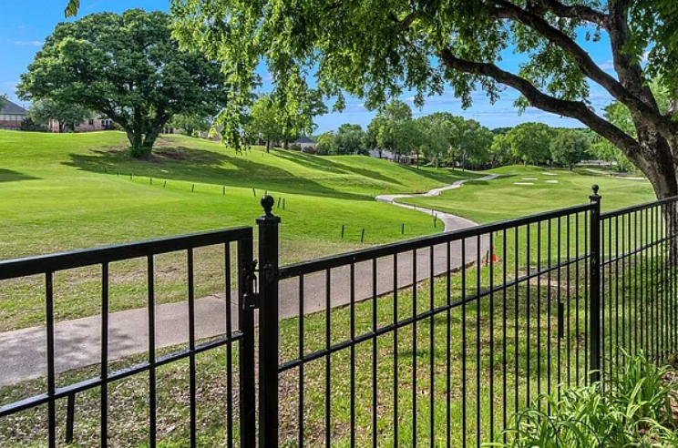 Rolling golf course hills and path at Hills of Prestonwood in Plano, Texas