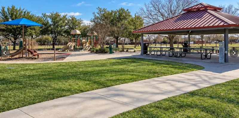 Playground and pavilion at a Hunters Glen area park in Plano, Texas