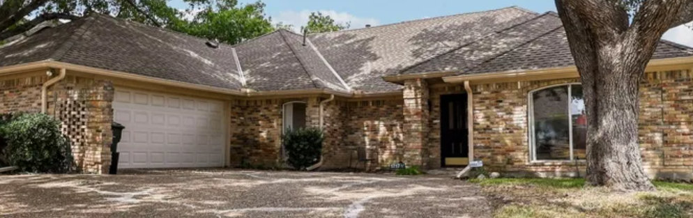 Single-story brick ranch home in Pitman Creek Estates, Plano, Texas