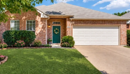 Single-story brick home with hip roof in Ridgeview Ranch, Plano, Texas