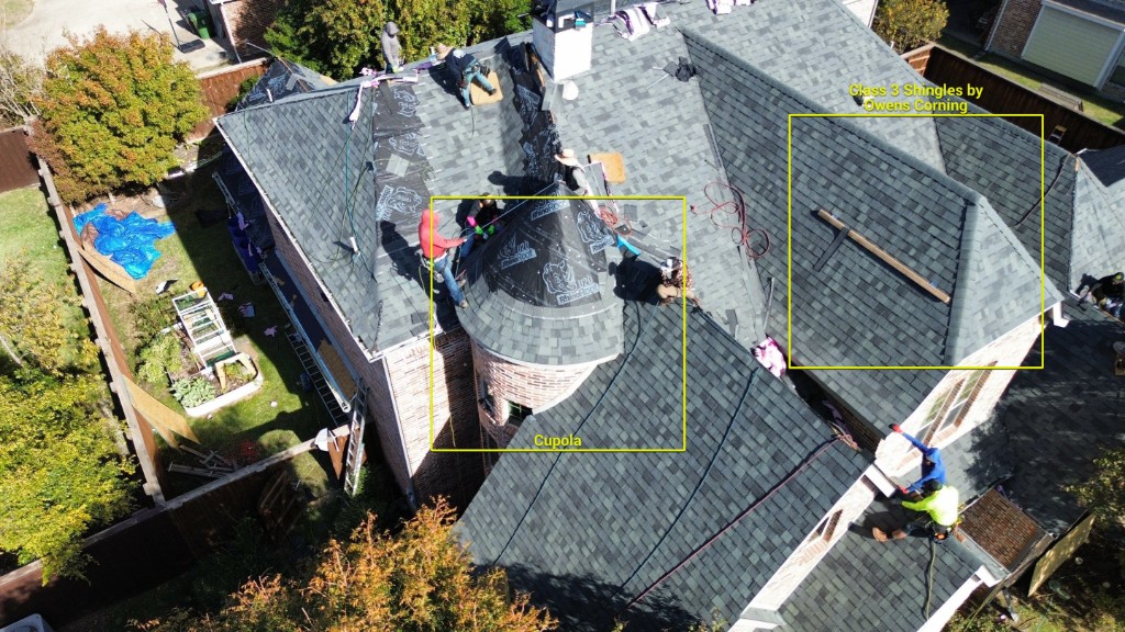 Roof crew installing Class 3 Owens Corning shingles on a cupola home in The Aviary, Murphy, Texas
