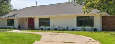 White ranch home with red door in Willow Wood Ranch Estates, Murphy, Texas