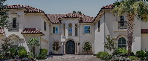 Mediterranean-style home with red tile roof in Windhaven, Plano, Texas